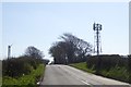 Communications mast and wind turbine by A395