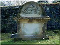 Gravestone with carved ship