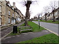 SP2512 : Memorial bench alongside a bus stop, The Hill, Burford by Jaggery
