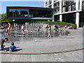 Fountain by Paddington Basin on a hot bank holiday