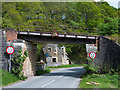 Road passing beneath railway bridge