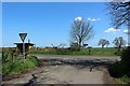 NZ1271 : Road junction east of Eachwick by Graham Robson