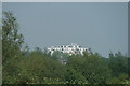 View of the new flats on the site of the Sir Winston Churchill pub on Chigwell Lane from the Roding Valley Nature Reserve