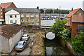 Spital Brook enters the River Esk