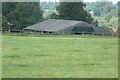 TL9991 : Barn at Hall Farm Horse Rescue Centre by Geographer