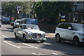 View of a 1970 Rover P5B Coupe passing along Court Road