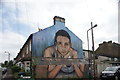 View of street art on the side of a house on the corner of Lime Street and Ritchings Avenue