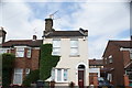 View of ivy growing on the side of a house on Ritchings Avenue