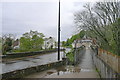 The High Street leaving Alness over the River Averon