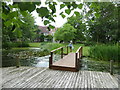 Decking and pond in the grounds of Pontlands Park Hotel, Great Baddow, Essex