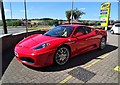 Red Ferrari at the "Jet" station in Chidswell