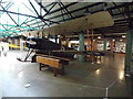 View of an Avro 504K and propeller vices in Hangar 2 in the RAF Museum