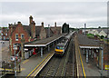 TM0558 : Stowmarket: a Norwich train by John Sutton