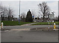 Direction and distances sign on a Henllys Way pedestrian refuge, Cwmbran