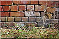 Benchmark on wall of former works building beside the Coventry Canal