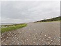 J1605 : View westwards along the beach east of Gyles Quay by Eric Jones