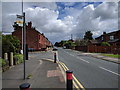 Bus stop on Leyland Lane, looking north