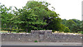 A gate in the wall beside Irvine Road