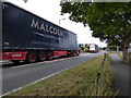 Malcolm Logistics trucks entering Fairlie