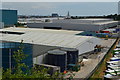 View over roof of paper mill with River Thames beyond