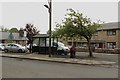 NU1300 : Bus stop, Rothbury Road, Longframlington by Graham Robson