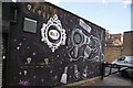 View of street art on the side wall of No. 1 Hair Workshop on Vernon Road