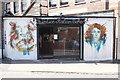 View of street art on the side walls of the new Delice Italian Bakery on Jewel Road