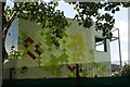 View of the Hillyfield Primary Academy from the path leading to Cazenove Road in Lloyd Park