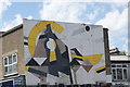 View of street art on the side of the East London Office Centre from St. Mary Road