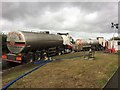 SH8076 : Tankers awaiting filling by Richard Hoare
