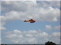 TL8427 : The Essex & Herts Air Ambulance about to land by Geographer