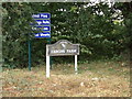 TL8525 : Herons Farm sign by Geographer