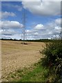 NU2107 : Pylon in harvested field by Oliver Dixon