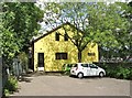 Yellow house at St Benedicts View