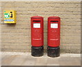 Elizabeth II postboxes and defibrillator on Curzon Street, Burnley