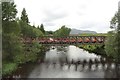 NN5893 : Temporary bridge crossing the River Spey by Graham Robson