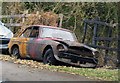 Burnt out car on Station Road