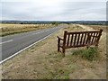 SP2816 : Seat beside a road on Shipton Down by Philip Halling