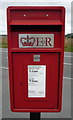 NZ3359 : Close up, Elizabeth II postbox on the A1290 by JThomas