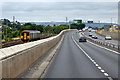 SX8770 : South Devon Mainline alongside the South Devon Highway by David Dixon