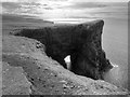 NG1839 : Natural arch on the Duirinish coastline by John Allan