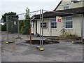 A hole in front of a closed pub