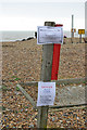 Warning notices about washed up cargo