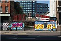 View of street art on the front of Block Food Court on Shoreditch High Street