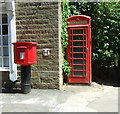 Elizabeth II postbox and telephone box on Manor Park Road, Glossop