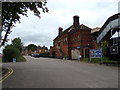 TL8928 : Station Road at Chappel & Wakes Colne Railway Station by Geographer