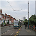 Hyson Green: a tram on Noel Street