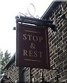 Sign for the Stop & Rest public house