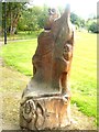 Carved seat in public park at Evanton