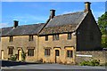 Stone houses by the entrance to Montacute House